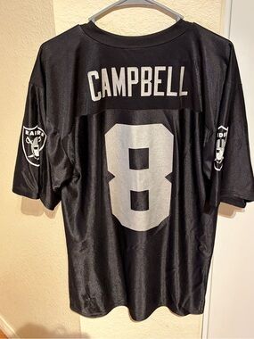 NFL Black Jersey with Silver Number 8